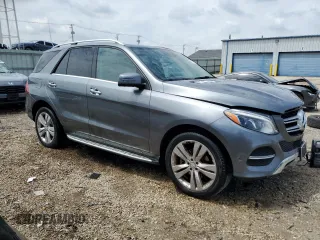 2018 Mercedes-Benz GLE 350 with VIN 4JGDA5HB1JB117315, listed as a Copart auction lot 57871285 with 144,261 mi miles and Salvage title. Bid and sale history available at DreamBid. Image 4.
