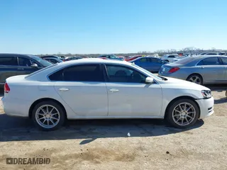 2014 Volkswagen Passat TDI SE w/Sunroof with VIN 1VWBN7A32EC016554, listed as a IAAI auction lot 41472156 with 178,149 mi miles. Bid and sale history available at carsss.com. Image 13.
