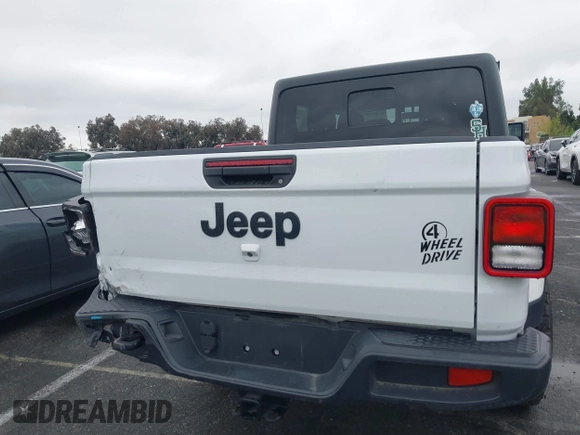 2022 Jeep Gladiator Willys with VIN 1C6HJTAG1NL148524, listed as a IAAI auction lot 41507693 with 42,004 mi miles and . Bid and sale history available at DreamBid. Image 16.