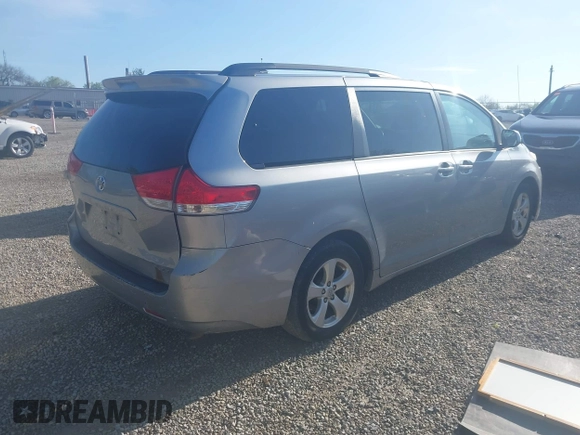 2013 Toyota Sienna LE AAS with VIN 5TDKK3DCXDS369976, listed as a IAAI auction lot 42161009 with 183,408 mi miles. Bid and sale history available at carsss.com. Image 4.
