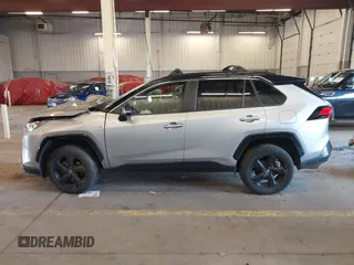2021 Toyota RAV4 Hybrid XSE with VIN JTME6RFV9MJ006665, listed as a IAAI auction lot 41964182 with 61,654 mi miles and . Bid and sale history available at DreamBid. Image 14.