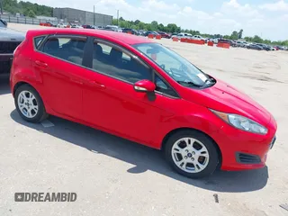 2015 Ford Fiesta SE z VIN 3FADP4EJ4FM166653, wystawiony jako IAAI lot #42410322 z przebiegiem 141 305 mil mil oraz . Historia ofert i sprzedaży dostępna na DreamBid. Obrazek 1.
