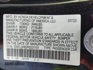 2023 Honda Civic Sport with VIN 19XFL2H82PE021151, listed as a IAAI auction lot 41943345 with 55,679 mi miles and . Bid and sale history available at DreamBid. Image 9.