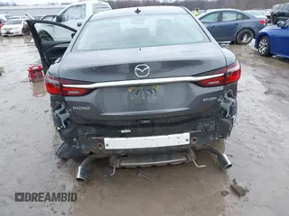 2020 Mazda 6 Grand Touring with VIN JM1GL1TYXL1524543, listed as a IAAI auction lot 41474337 with 52,160 mi miles and . Bid and sale history available at DreamBid. Image 6.