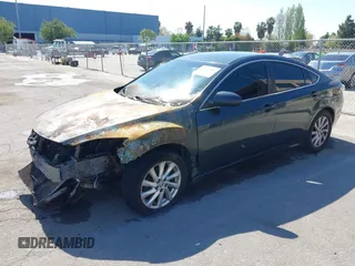 2012 Mazda 6 i Touring with VIN 1YVHZ8DH4C5M34382, listed as a IAAI auction lot 42082869 with Not provided miles and . Bid and sale history available at DreamBid. Image 2.
