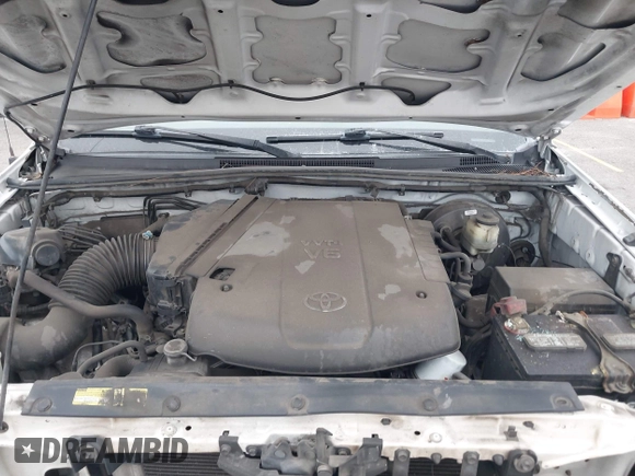 2014 Toyota Tacoma PreRunner z VIN 3TMJU4GN3EM170360, wystawiony jako IAAI lot #42438394 z przebiegiem 223 101 mil mil oraz . Historia ofert i sprzedaży dostępna na DreamBid. Obrazek 10.