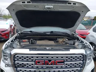 2020 GMC Sierra 1500 Denali with VIN 3GTU9FEL8LG295605, listed as a IAAI auction lot 41922060 with 65,561 mi miles and . Bid and sale history available at DreamBid. Image 10.
