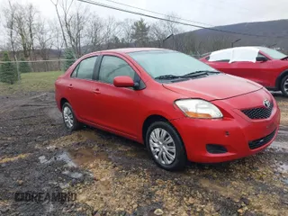 2009 Toyota Yaris with VIN JTDBT903491326454, listed as a IAAI auction lot 41985429 with 220,307 mi miles. Bid and sale history available at carsss.com. Image 1.