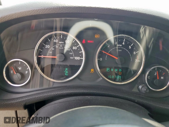 2013 Jeep Wrangler Unlimited Sport z VIN 1C4BJWDGXDL606491, wystawiony jako Copart lot #56065425 z przebiegiem 168 709 mil mil oraz Szkoda całkowita • Salvage title. Historia ofert i sprzedaży dostępna na DreamBid. Obrazek 9.