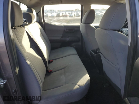 2017 Toyota Tacoma SR z VIN 5TFAX5GN8HX087468, wystawiony jako Copart lot #49354265 z przebiegiem 156 991 mil mil oraz Szkoda całkowita • Salvage title. Historia ofert i sprzedaży dostępna na DreamBid. Obrazek 10.