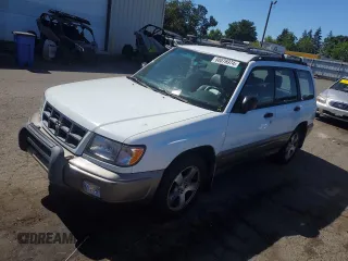 1999 Subaru Forester S with VIN JF1SF6557XH703160, listed as a Copart auction lot 60076974 with 0 mi miles and Salvage Title. Bid and sale history available at carsss.com. Image 1.