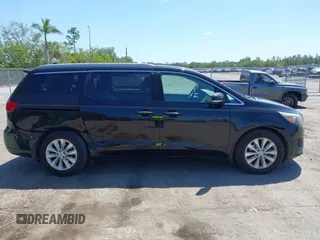 2016 Kia Sedona SX with VIN KNDMC5C15G6143818, listed as a IAAI auction lot 42051284 with 97,666 mi miles and . Bid and sale history available at carsss.com. Image 14.