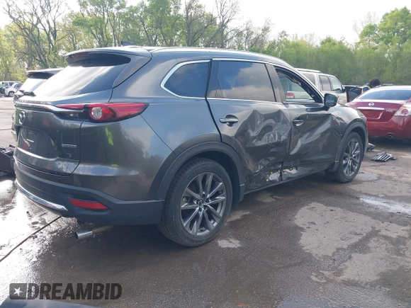 2020 Mazda CX-9 Signature with VIN JM3TCBEYXL0402053, listed as a IAAI auction lot 42070846 with 47,695 mi miles and . Bid and sale history available at DreamBid. Image 4.