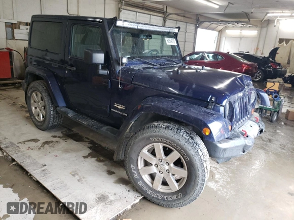 2013 Jeep Wrangler Sahara z VIN 1C4AJWBG4DL504800, wystawiony jako Copart lot #60504575 z przebiegiem 166 687 mil mil oraz Szkoda całkowita • Salvage title. Historia ofert i sprzedaży dostępna na DreamBid. Obrazek 4.