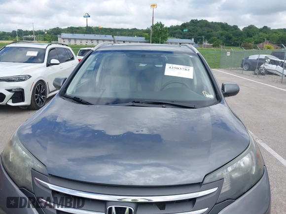 2013 Honda CR-V EX-L с VIN 2HKRM4H70DH628668, выставлен на аукционе IAAI как лот 42503782 с пробегом 129 823 миль миль и . История ставок и продаж доступна на DreamBid. Изображение 6.