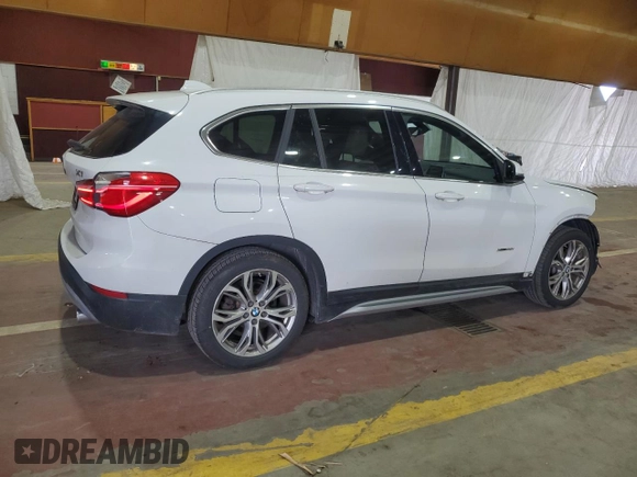 2017 BMW X1 xDrive28i with VIN WBXHT3Z34H4A54811, listed as a Copart auction lot 63584405 with 92,699 mi miles and Salvage title. Bid and sale history available at DreamBid. Image 3.