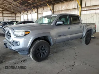 2018 Toyota Tacoma SR with VIN 3TMCZ5AN9JM171287, listed as a Copart auction lot 65407305 with 112,576 mi miles and Salvage title. Bid and sale history available at DreamBid. Image 1.