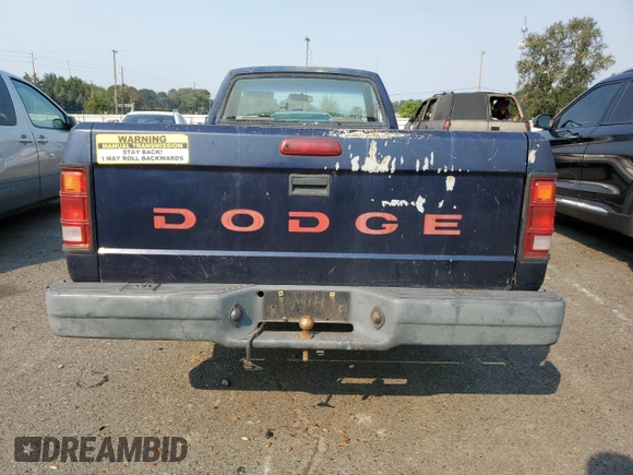 1994 Dodge Dakota z VIN 1B7FL26XXRS606540, wystawiony jako Copart lot #70103064 z przebiegiem 123 850 mil mil oraz Czysty tytuł • Clean title. Historia ofert i sprzedaży dostępna na DreamBid. Obrazek 6.