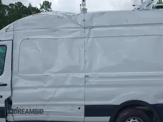 2024 Ford Transit Cargo with VIN 1FTBR3X86RKA46123, listed as a IAAI auction lot 42490695 with 13,258 mi miles and . Bid and sale history available at DreamBid. Image 14.