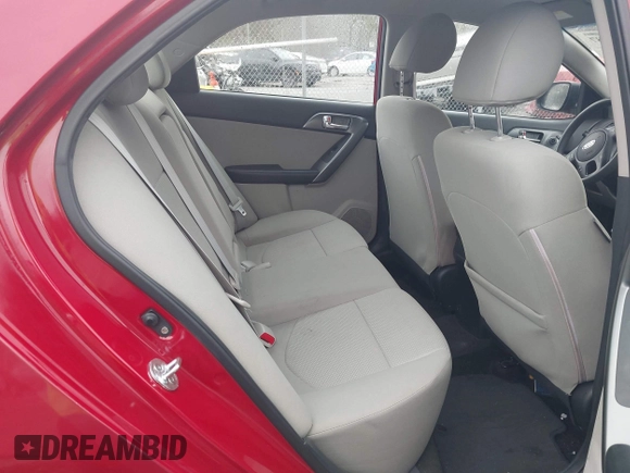 2013 Kia Forte EX with VIN KNAFU4A27D5729222, listed as a IAAI auction lot 42005687 with 124,785 mi miles. Bid and sale history available at carsss.com. Image 8.