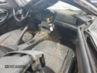 1999 Porsche 911 z VIN WP0CA2990XS651649, wystawiony jako Copart lot #45002045 z przebiegiem Nie podano mil oraz Szkoda całkowita • Salvage title. Historia ofert i sprzedaży dostępna na DreamBid. Obrazek 8.