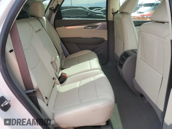 2021 Cadillac XT5 FWD Premium Luxury with VIN 1GYKNCRS0MZ110560, listed as a Copart auction lot 52779575 with 44,559 mi miles and Salvage title. Bid and sale history available at DreamBid. Image 11.