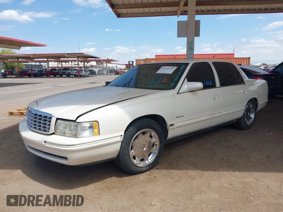 1999 Cadillac DeVille z VIN 1G6KD54YXXU794294, wystawiony jako IAAI lot #42141931 z przebiegiem 161 408 mil mil oraz . Historia ofert i sprzedaży dostępna na DreamBid. Obrazek 2.