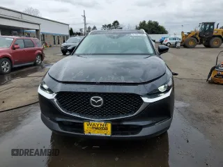 2025 Mazda CX-30 S Carbon Edition z VIN 3MVDMBCM9SM802108, wystawiony jako Copart lot #51937335 z przebiegiem 1 960 mil mil oraz Szkoda całkowita • Salvage title. Historia ofert i sprzedaży dostępna na DreamBid. Obrazek 5.