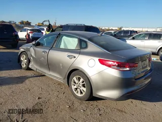 2016 Kia Optima LX with VIN 5XXGT4L39GG102599, listed as a IAAI auction lot 41748147 with 104,712 mi miles. Bid and sale history available at carsss.com. Image 3.