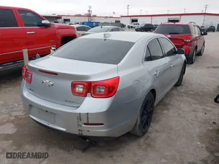 2015 Chevrolet Malibu LTZ with VIN 1G11F5SL6FF292811, listed as a IAAI auction lot 40794937 with 221,634 mi miles. Bid and sale history available at carsss.com. Image 4.