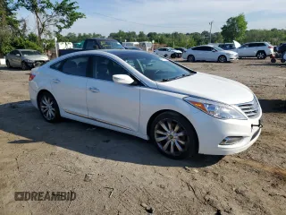 2013 Hyundai Azera with VIN KMHFH4JG6DA262297, listed as a Copart auction lot 56781155 with 234,793 mi miles and Clean Title. Bid and sale history available at DreamBid. Image 4.