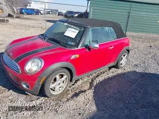 2010 MINI Convertible with VIN WMWMR3C59ATU97398, listed as a IAAI auction lot 41714054 with 12,663 mi miles and . Bid and sale history available at DreamBid. Image 2.