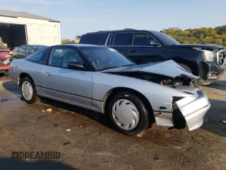1990 Nissan 240SX z VIN JN1HS36P0LW121487, wystawiony jako Copart lot #70670904 z przebiegiem 123 794 mil mil oraz Szkody całkowita. Historia ofert i sprzedaży dostępna na DreamBid. Obrazek 4.