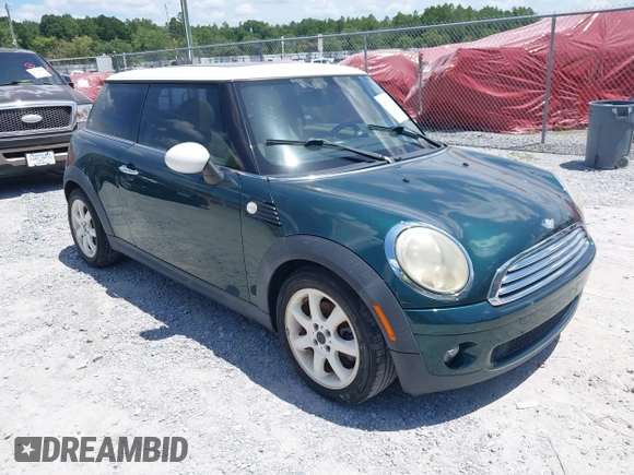 2010 MINI Hardtop with VIN WMWMF3C5XATZ23107, listed as a IAAI auction lot 42732300 with 100,747 mi miles and . Bid and sale history available at DreamBid. Image 1.