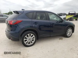 2015 Mazda CX-5 Grand Touring with VIN JM3KE4DY1F0480406, listed as a Copart auction lot 52349945 with 166,515 mi miles and Salvage Title. Bid and sale history available at carsss.com. Image 3.