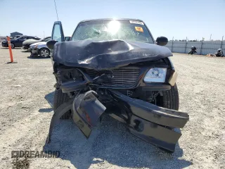 2001 Ford F-150 XLT with VIN 1FTRW07LX1KB47311, listed as a Copart auction lot 58848395 with Not provided miles and Salvage title. Bid and sale history available at DreamBid. Image 5.