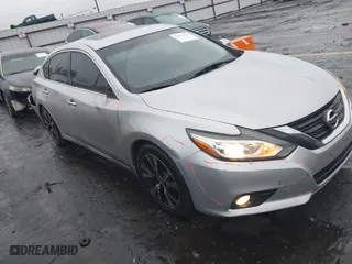 2016 Nissan Altima 2.5 SL with VIN 1N4AL3AP4GC280514, listed as a IAAI auction lot 41543329 with 154,268 mi miles. Bid and sale history available at carsss.com. Image 1.