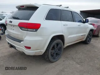 2015 Jeep Grand Cherokee Laredo with VIN 1C4RJFAG4FC631179, listed as a IAAI auction lot 41744865 with 184,872 mi miles. Bid and sale history available at carsss.com. Image 4.