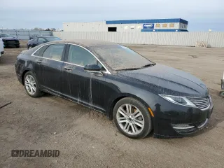2015 Lincoln MKZ z VIN 3LN6L2JK4FR616026, wystawiony jako Copart lot #50409605 z przebiegiem 207 854 mil mil oraz Czysty tytuł • Clean title. Historia ofert i sprzedaży dostępna na DreamBid. Obrazek 4.