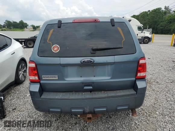 2010 Ford Escape XLS with VIN 1FMCU0C78AKD44185, listed as a Copart auction lot 60876155 with 157,399 mi miles and Salvage title. Bid and sale history available at DreamBid. Image 6.