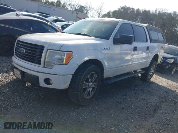 2014 Ford F-150 XL with VIN 1FTFW1EF2EFB93610, listed as a IAAI auction lot 41515501 with 211,415 mi miles and . Bid and sale history available at DreamBid. Image 17.