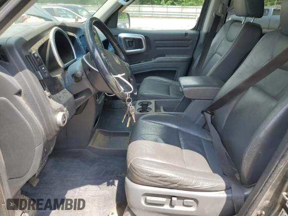 2008 Honda Ridgeline RTL z VIN 2HJYK16528H529507, wystawiony jako Copart lot #60049855 z przebiegiem 173 863 mil mil oraz Szkoda całkowita • Salvage title. Historia ofert i sprzedaży dostępna na DreamBid. Obrazek 7.