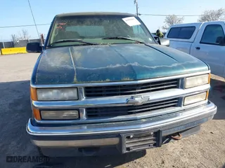 1997 Chevrolet Tahoe with VIN 1GNEK13RXVJ375189, listed as a IAAI auction lot 41959601 with 153,589 mi miles. Bid and sale history available at carsss.com. Image 6.