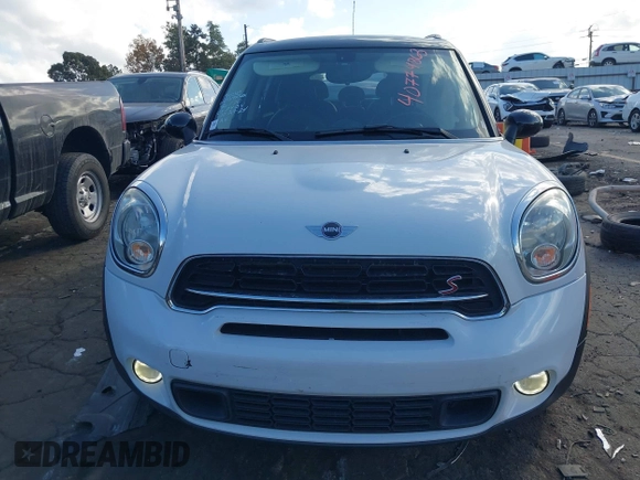 2015 MINI Countryman S with VIN WMWZC3C5XFWT06360, listed as a IAAI auction lot 40774863 with 127,383 mi miles and . Bid and sale history available at DreamBid. Image 12.