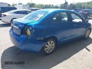 2009 Toyota Yaris with VIN JTDBT903091345311, listed as a IAAI auction lot 40269675 with 156,874 mi miles. Bid and sale history available at carsss.com. Image 4.