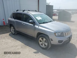 2016 Jeep Compass Sport with VIN 1C4NJDBB1GD566261, listed as a IAAI auction lot 42122853 with 212,060 mi miles. Bid and sale history available at carsss.com. Image 1.