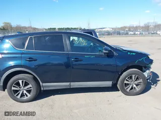 2018 Toyota RAV4 XLE with VIN 2T3RFREV3JW799039, listed as a IAAI auction lot 41875996 with 110,846 mi miles. Bid and sale history available at carsss.com. Image 14.