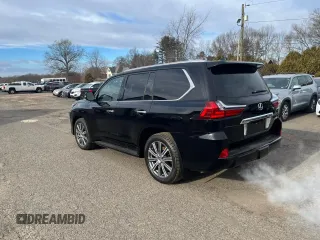 2017 Lexus LX with VIN JTJHY7AX4H4234031, listed as a Copart auction lot 87841285 with 164,415 mi miles and Clean Title. Bid and sale history available at carsss.com. Image 2.