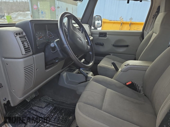 2004 Jeep Wrangler Sahara with VIN 1J4FA59S64P774768, listed as a Copart auction lot 49868895 with 120,800 mi miles and Salvage Title. Bid and sale history available at DreamBid. Image 7.