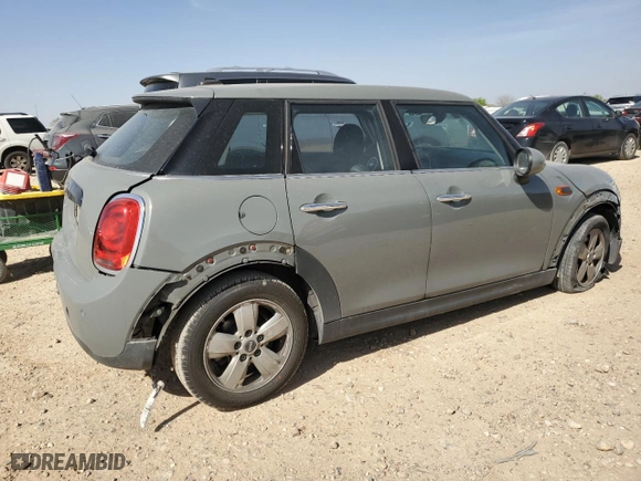 2019 MINI Hardtop 4 Door Cooper with VIN WMWXU1C57K2L09744, listed as a Copart auction lot 49324595 with 40,554 mi miles and Salvage Title. Bid and sale history available at carsss.com. Image 3.